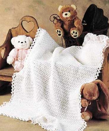 tricoter un plaid pour un nouveau-né avec des aiguilles à tricoter