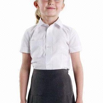 Objet obligatoire de la garde-robe des enfants - blouse scolaire