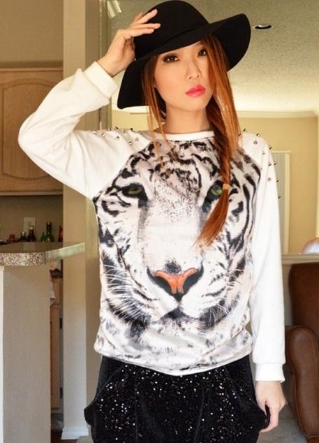 Une tendance élégante - une veste avec un tigre